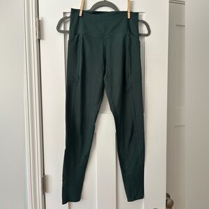 Girlfriend collective dark green leggings with pockets size S